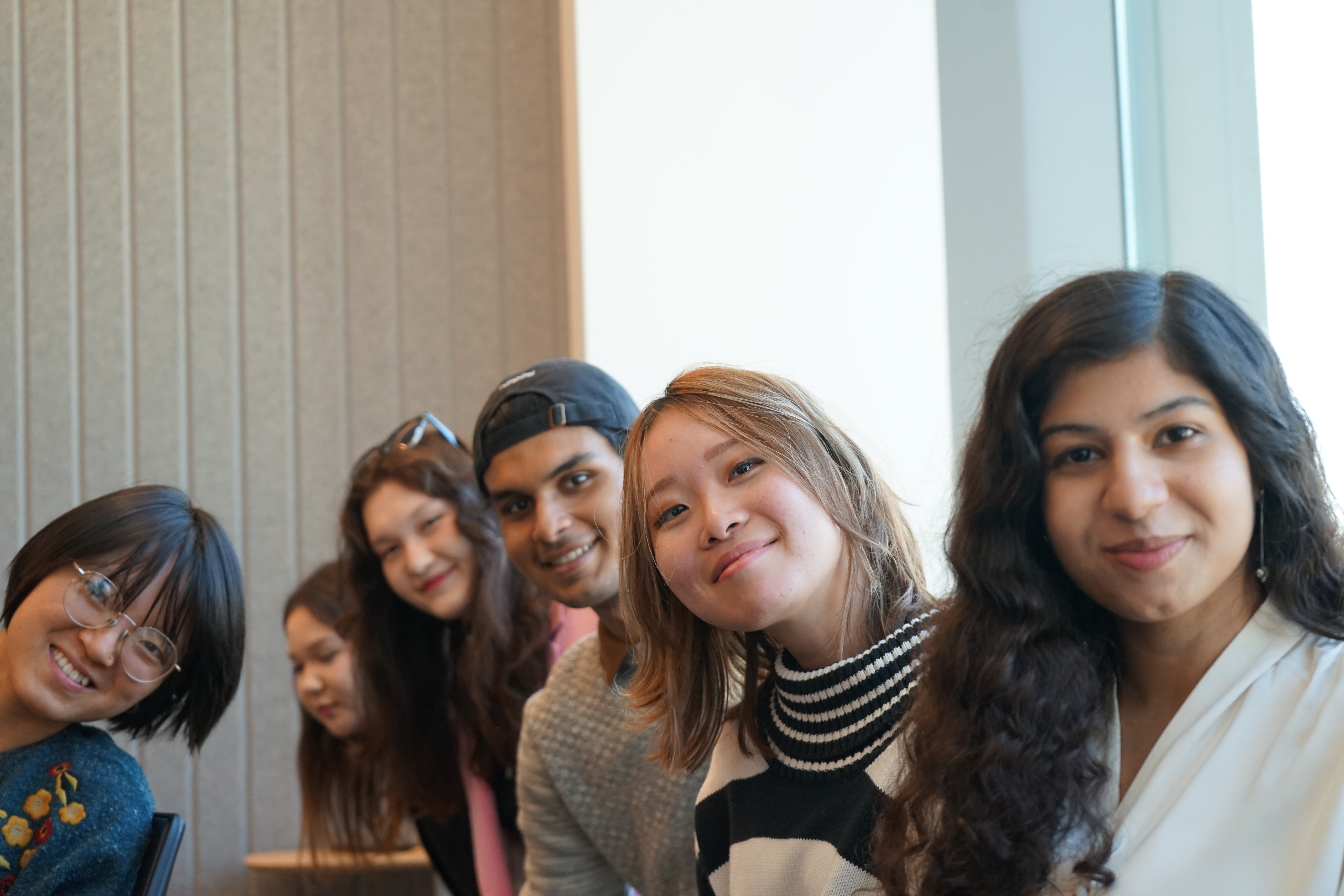 A student writing in a classroom supported by the Lighthouse Foundation